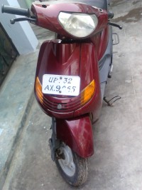 Maroon Bajaj Spirit