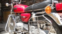 Red Yamaha RX 100