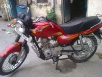 Red Bajaj Caliber