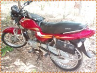 Red Bajaj Caliber