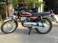 Silver Yamaha RX 100