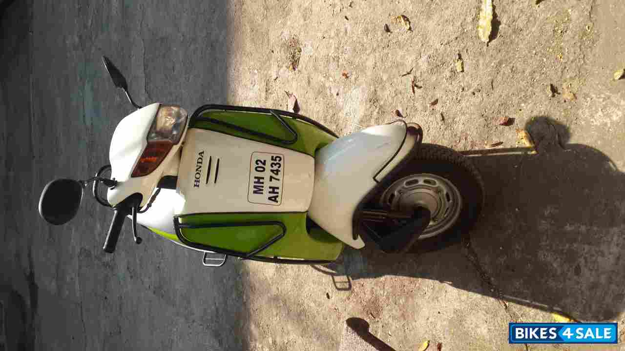 Green White Honda Activa