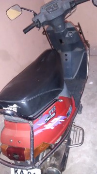 Red TVS Scooty ES