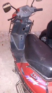 Red TVS Scooty ES