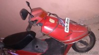 Red TVS Scooty ES