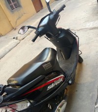 Black & Red TVS Scooty Streak