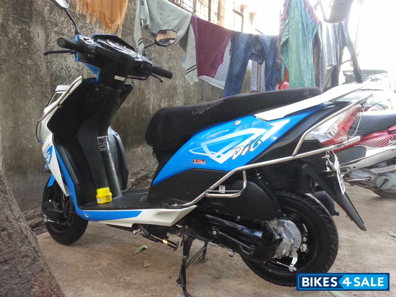 Blue & White Honda Dio