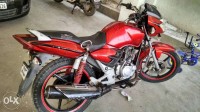 Red TVS Apache 150