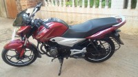 Red Bajaj Discover 100T