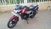 Red Bajaj Discover 100T