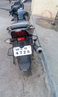 Red Bajaj Discover 100T