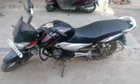 Red Bajaj Discover 100T