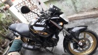 Black-golden Yamaha FZ16