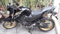 Black-golden Yamaha FZ16