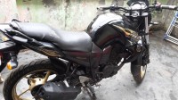 Black-golden Yamaha FZ16