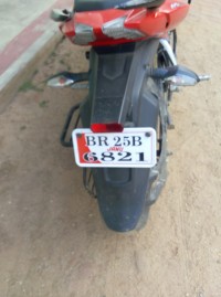 Red Bajaj Pulsar AS 150