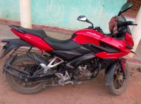 Red Bajaj Pulsar AS 150