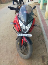 Red Bajaj Pulsar AS 150