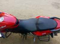 Red Bajaj Pulsar AS 150