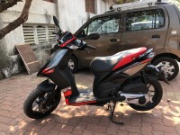 Black Aprilia SR 150