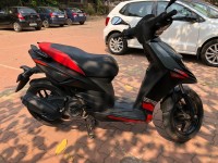 Black Aprilia SR 150