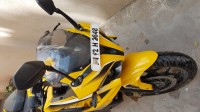 Yellow Bajaj Pulsar RS 200 ABS