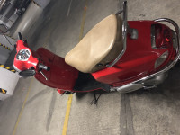 Cherry Red Vespa LX 125