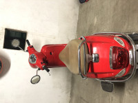 Cherry Red Vespa LX 125