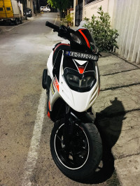 White Aprilia SR 150