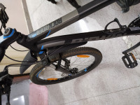 Black Bicycle  Btwin Rockrider 520, black color, price negotiable