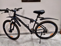 Black Bicycle  Btwin Rockrider 520, black color, price negotiable