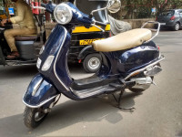 Blue Vespa VX 125