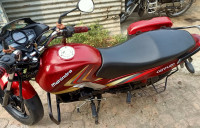 Red Mahindra Centuro NXT