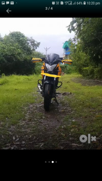 Yellow Bajaj Pulsar 200 NS