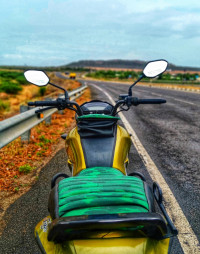 Lite Yellow Honda CB Trigger