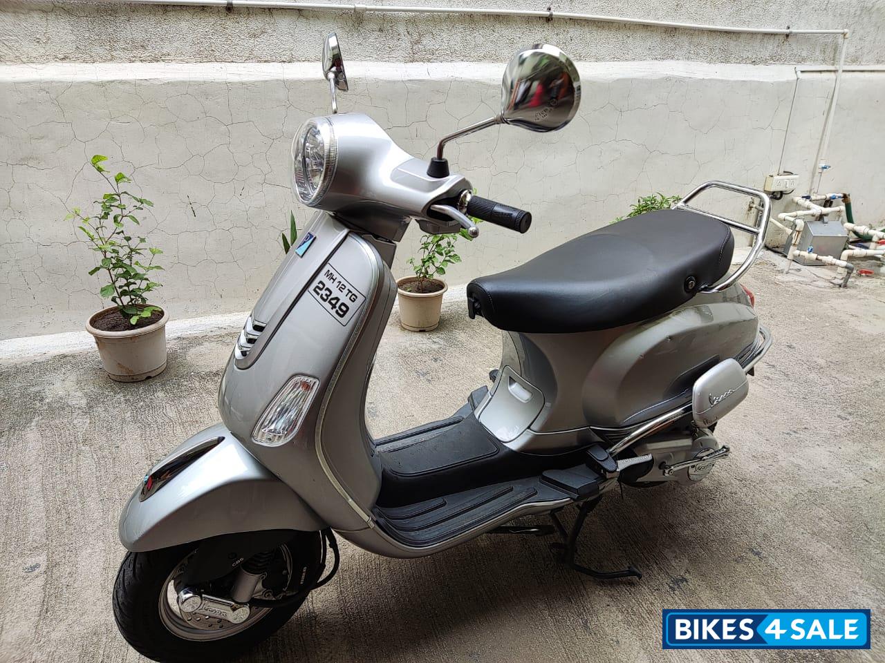 Silver Vespa VX 125