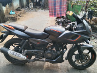 Matte Black And Neon Orange Bajaj Pulsar 180