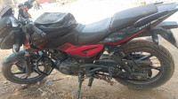 Black And Red Bajaj Pulsar 150 Twin Disc