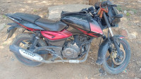 Black And Red Bajaj Pulsar 150 Twin Disc