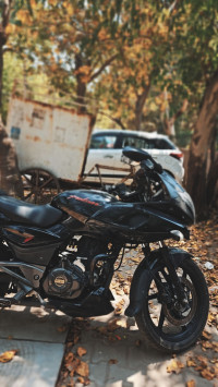 Black And Red Bajaj Pulsar 180F Neon