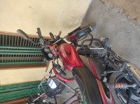 Red And Black Bajaj Platina 100 ES