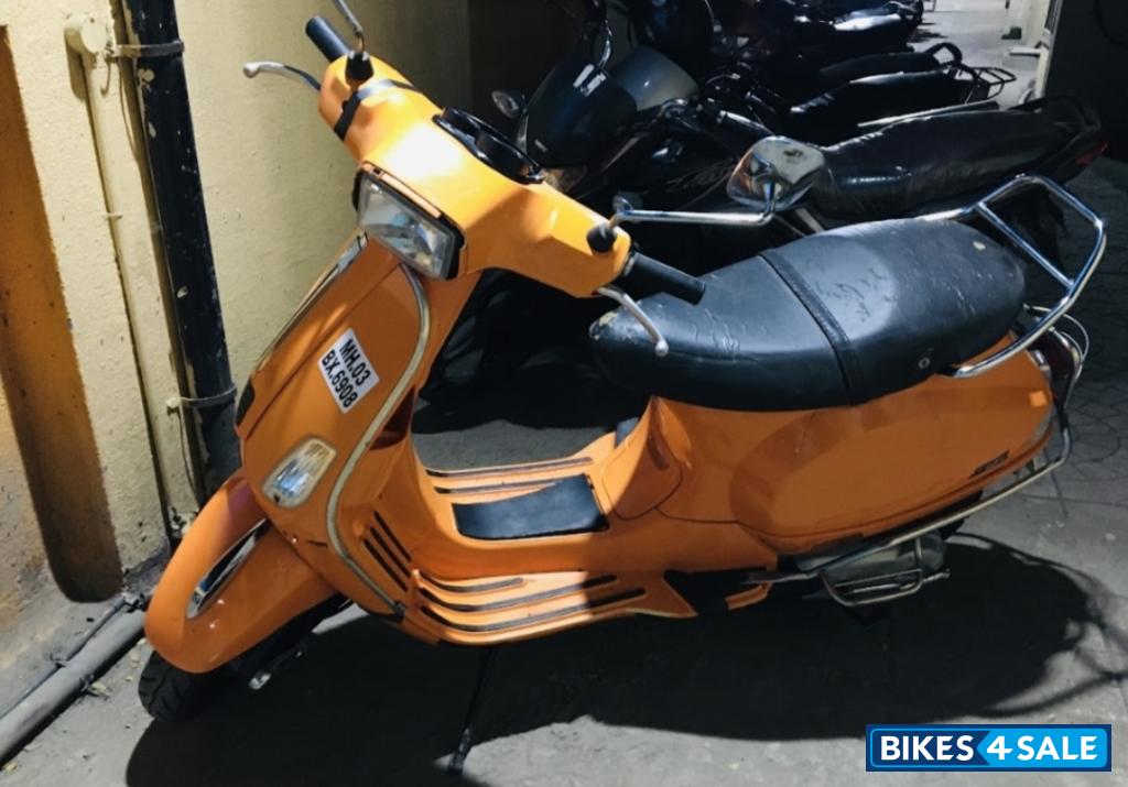 Orange Vespa S 125