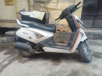 Milky White Mahindra Gusto