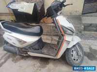 Milky White Mahindra Gusto