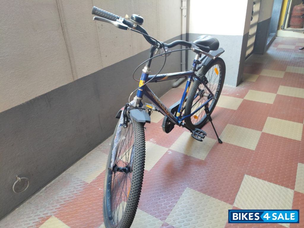 Blue And Orange Bicycle Hercules