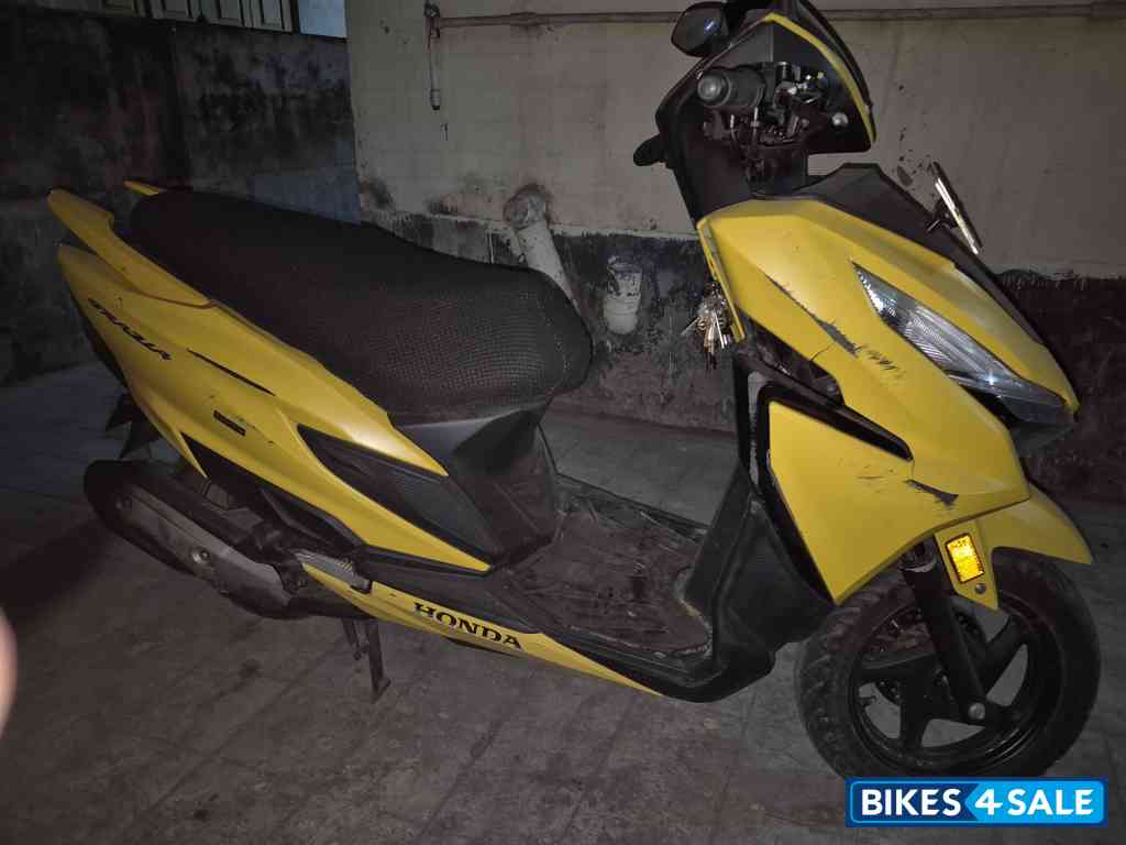 Yellow Honda Grazia