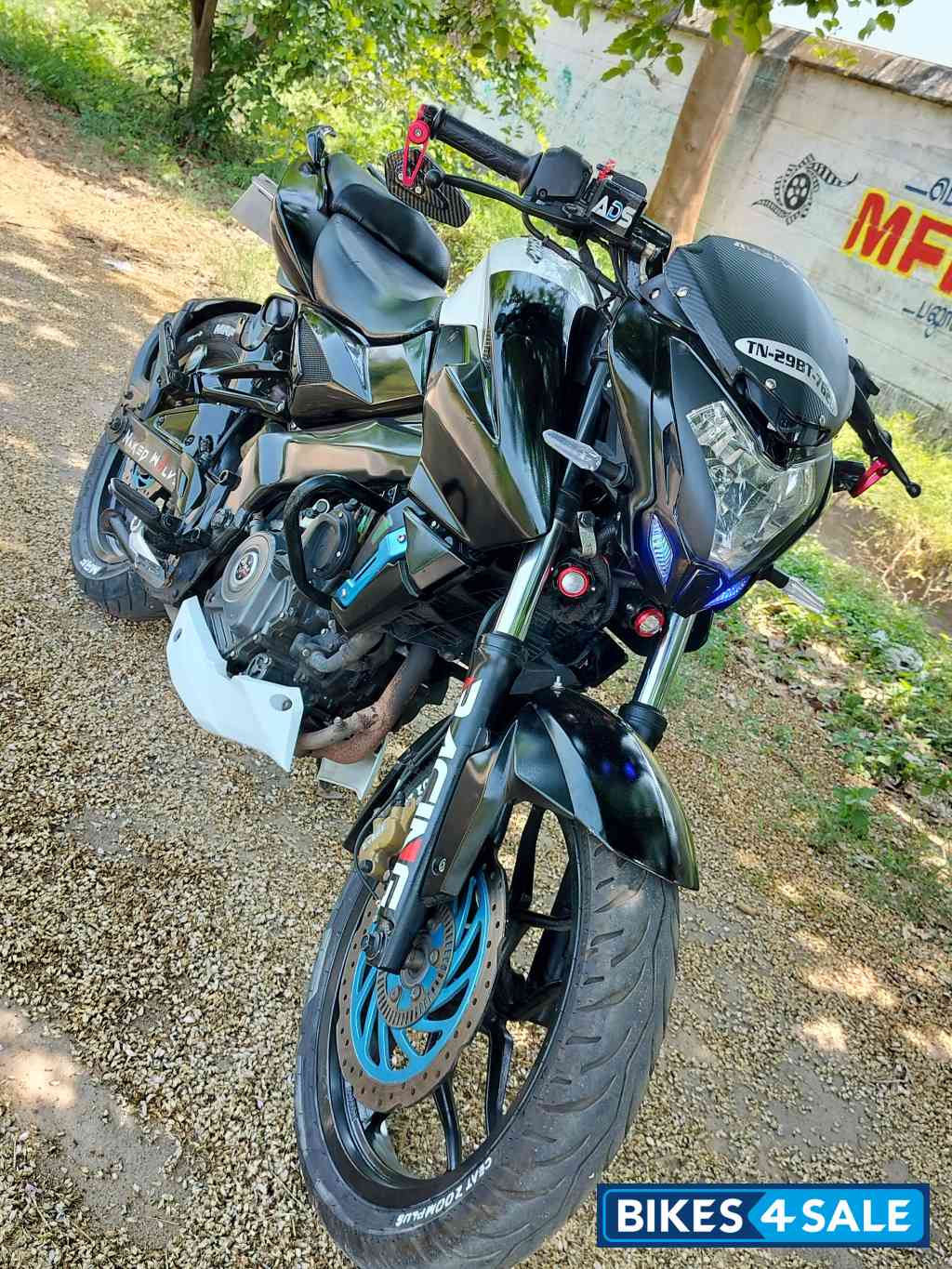 White And Black Bajaj Pulsar NS200