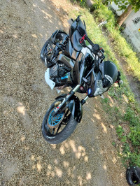 White And Black Bajaj Pulsar NS200