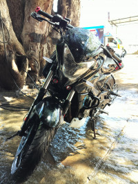White And Black Bajaj Pulsar NS200