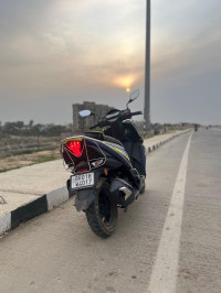 Neon-blue TVS NTORQ 125 XT